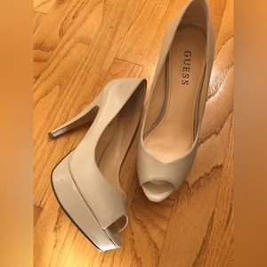 Gently used size 7 Guess Tan heels